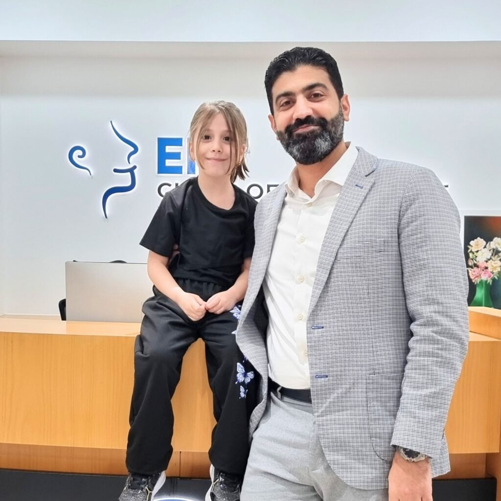 Child with Dr. Hatem Dalati after Coblation ENT surgery at ENT Clinic of Excellence in Dubai